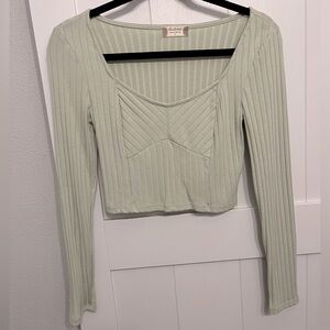 Very light sage green cropped long sleeve top